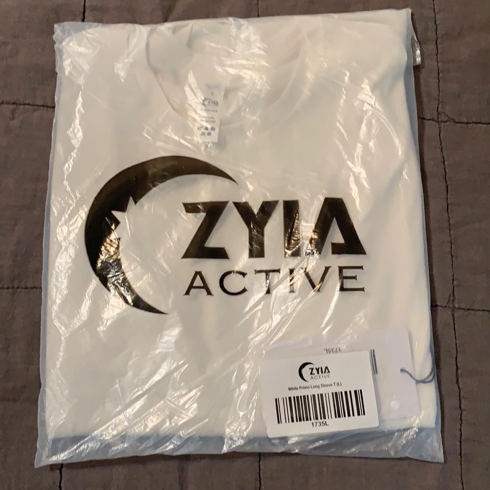 NWT Zyia White Primo Long Sleeve T. Size L.